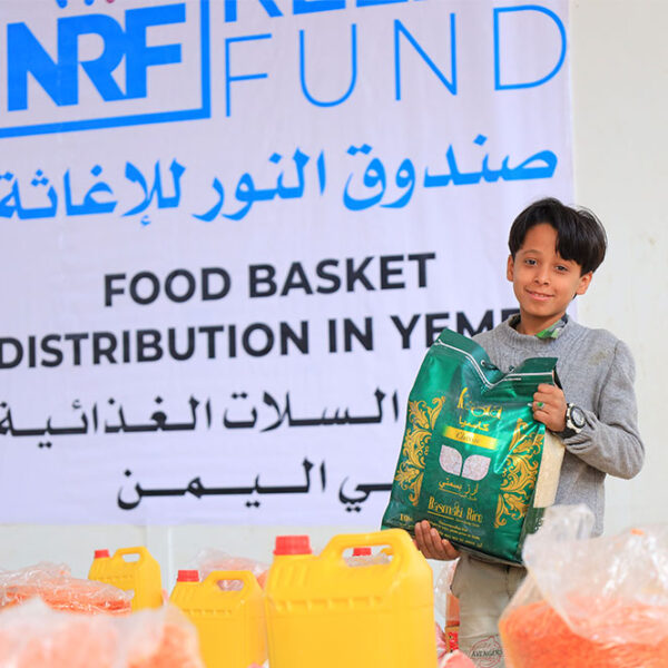 Noor Relief Fund | Boy with Food Basket